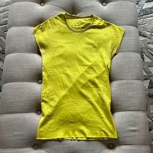 Highlighter yellow, Lululemon, worn, athletic shirt sleeve shirt. Size 2/4.